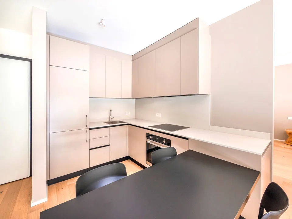 Appartement neuf de 2,5 pièces avec jardin privé et portique