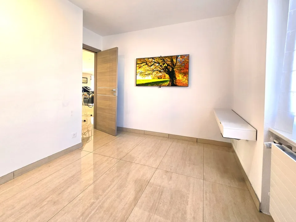 Eccezionale appartamento di 4,5 locali a Breganzona / Außergewöhnliche 4,5-Zimmer-Wohnung in Breganzona