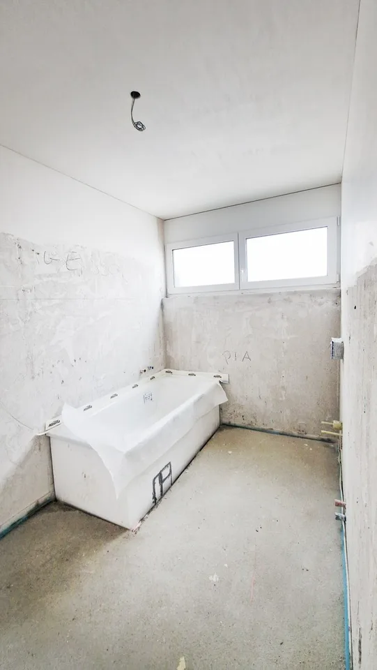 Neue 4,5-Zimmer-Wohnung im modernen Stil mit Veranda und großem privatem Garten