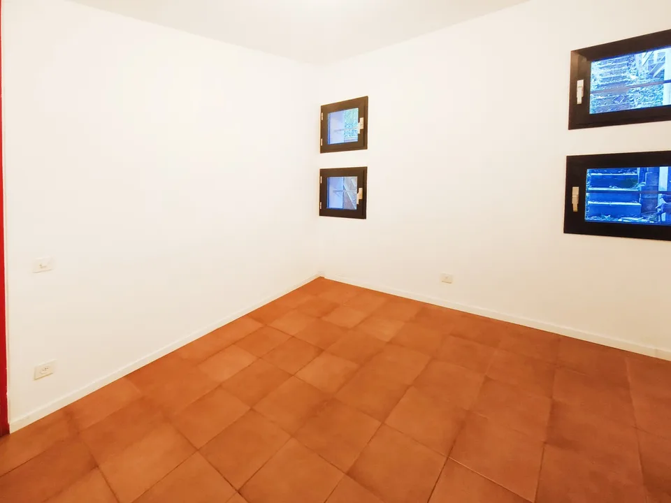 Intéressante maison bifamiliale de deux 3,5 pièces avec jardin à proximité du centre