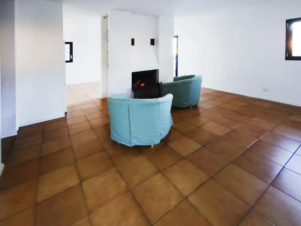 Intéressante maison bifamiliale de deux 3,5 pièces avec jardin à proximité du centre