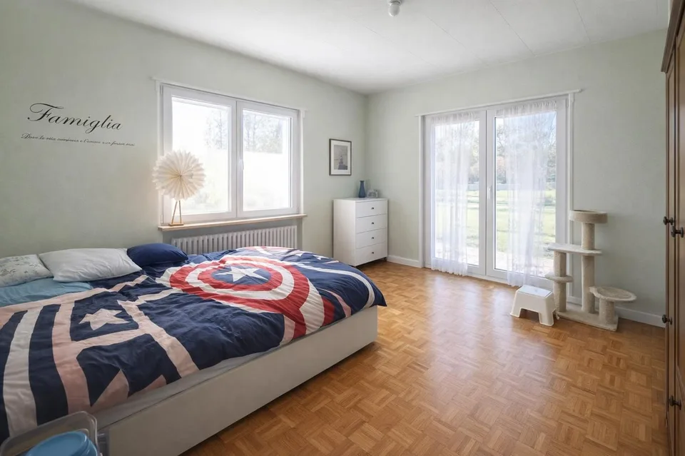 Bifamilienhaus 4,5 und 4,5 mit Garten, drei Terrassen und großer Dachboden.