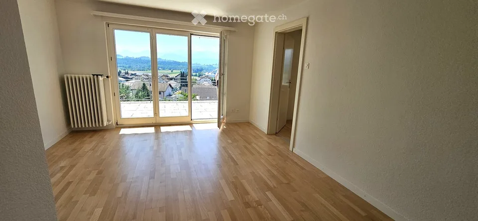 Appartement 4 pièces avec grande terrasse et vue panoramique sur les préalpes