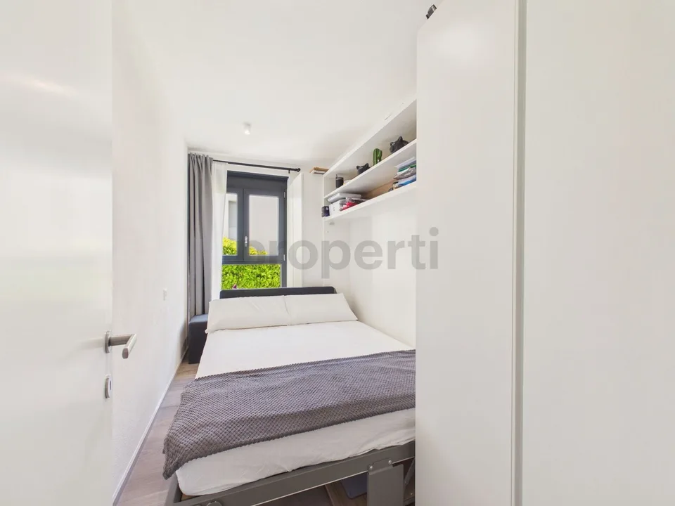 Elegante 3.5 locali con vista lago e posto auto interno, Aldesago