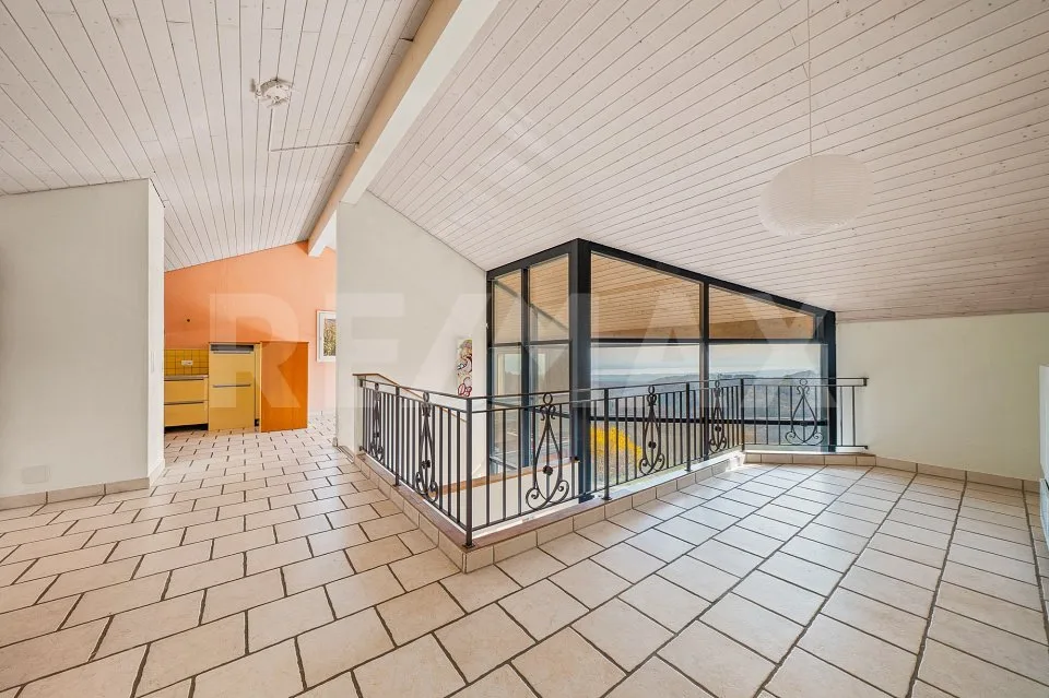 Für Renovationsliebhaber: Familienhaus mit Seeblick