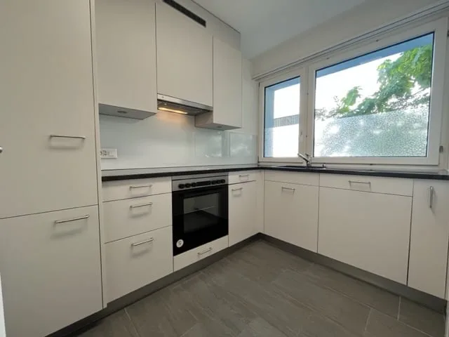 Tolle 2 Zimmer-Wohnung mit gedecktem Sitzplatz und Gartenanteil