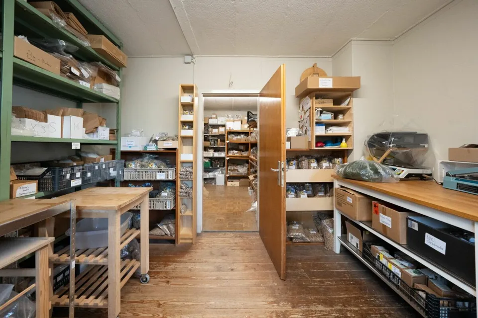 Two-family house with garages, workshop, and storage rooms for sale