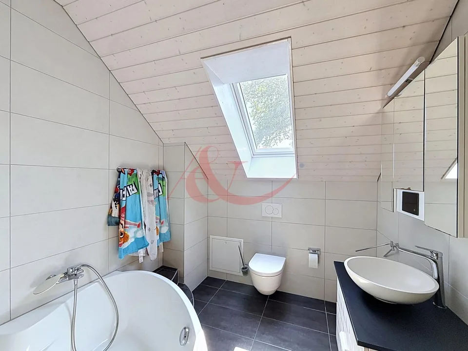 Maison mitoyenne de 5.5 pièces - Moudon