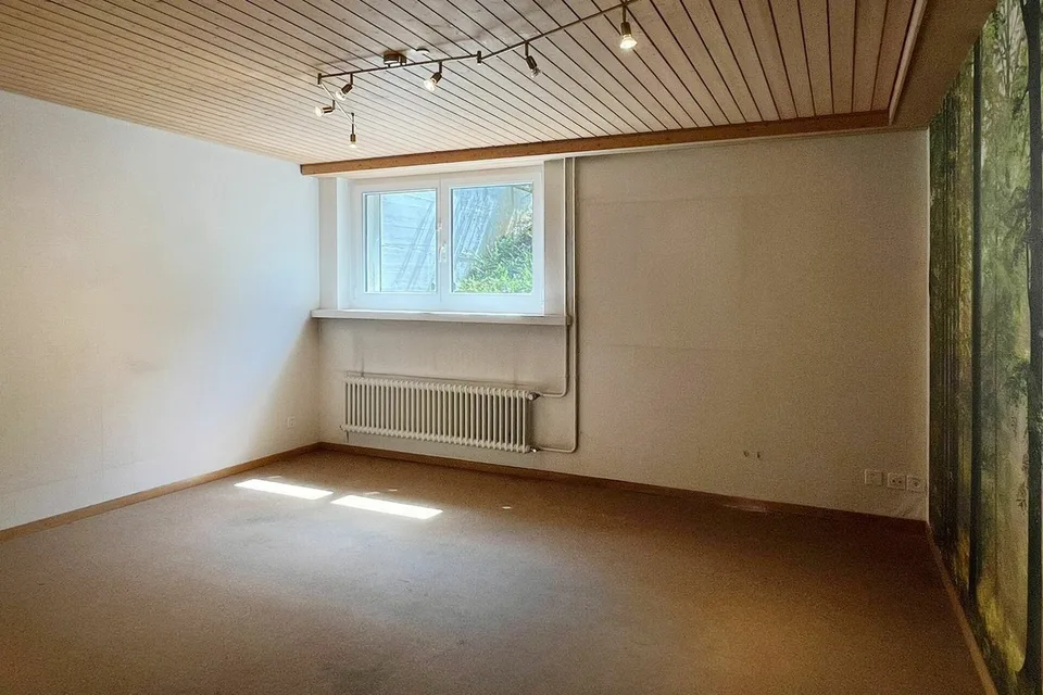 Einfamilienhaus mit Garten in einem ruhigen Wohnquartier