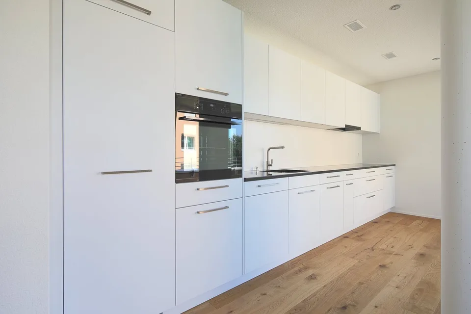 Modern 3.5-room apartment in a quiet location surrounded by greenery in Orpund