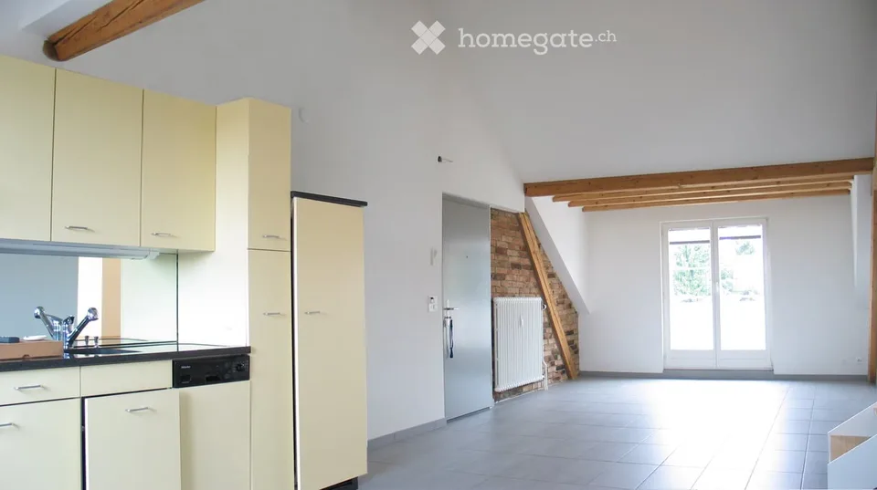 Appartamento loft su 147 m² di spazio abitabile (178 m² di superficie totale) con altezze di stanza fino a 3,50 metri