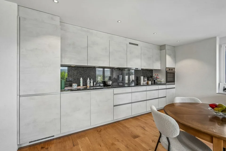 Appartement-jardin 2.5 pièces avec vue sur le Limmattal