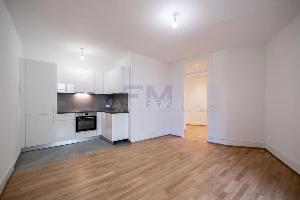 Carouge - Rue des Caroubiers - 2-Zimmer-Wohnung von etwa 47m2 im Erdgeschoss