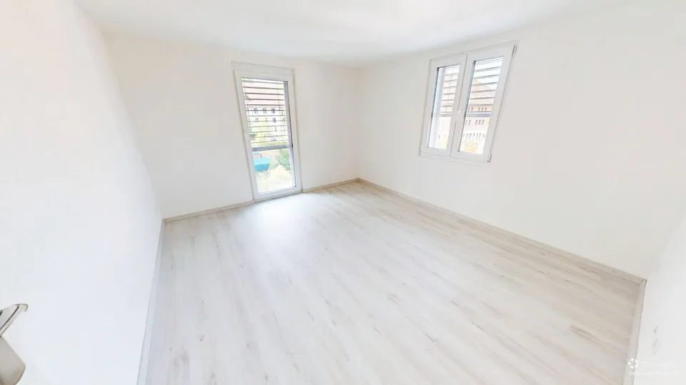 Appartamento di 2,5 locali ristrutturato di recente con balcone nel cuore di Herzogen