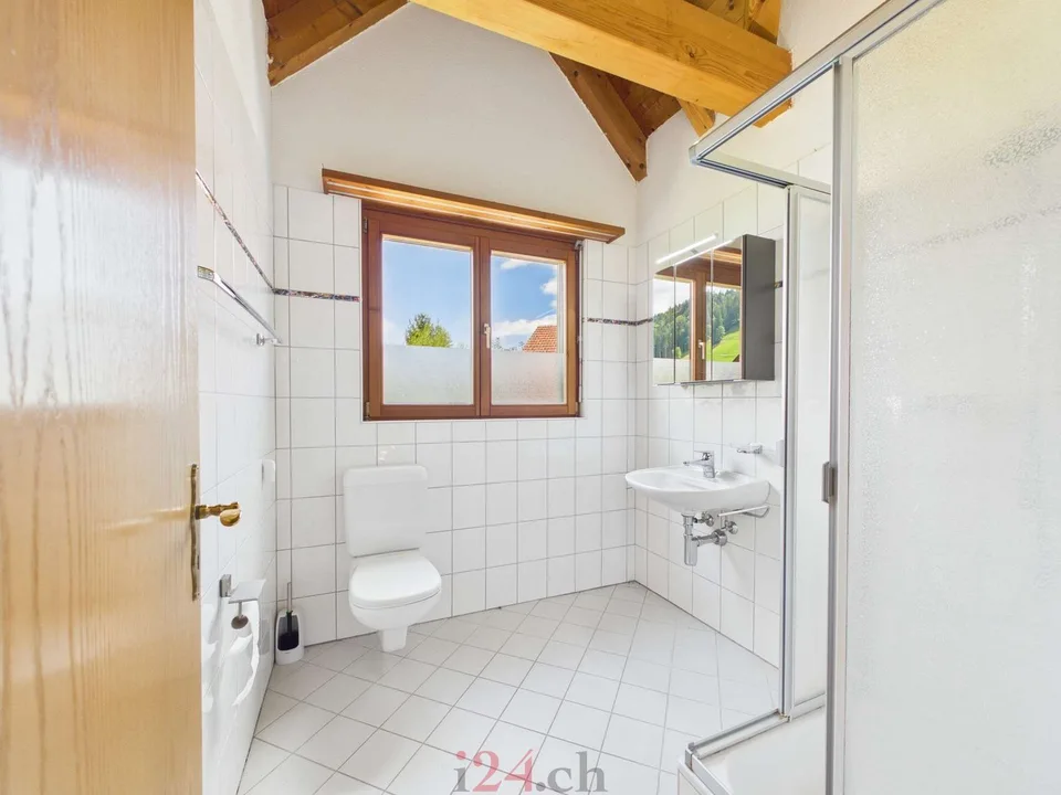 Casa a schiera di 6,5 locali con studio, giardino e vista sulla montagna