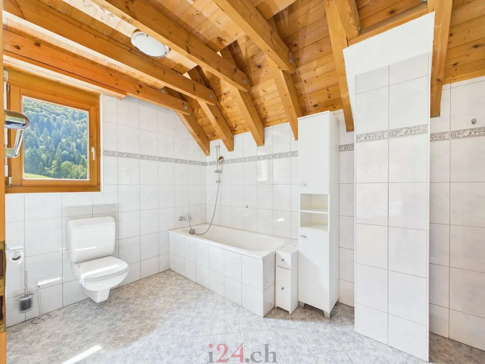 Casa a schiera di 6,5 locali con studio, giardino e vista sulla montagna