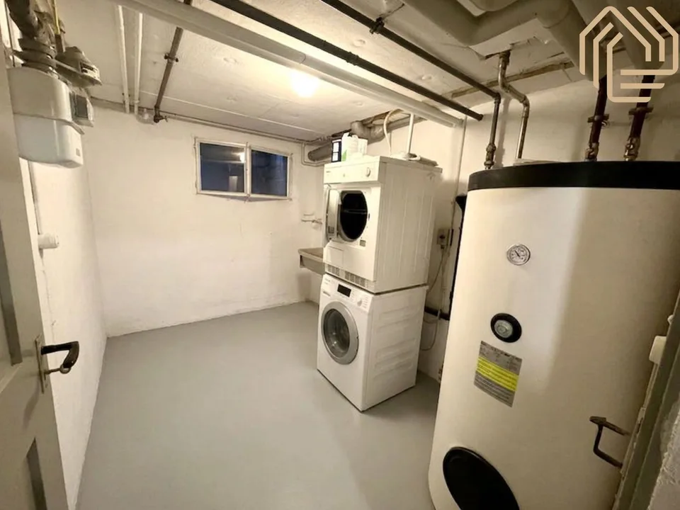 Grosszügige 5.5-Zimmer-Gartenwohnung mit Wintergarten, Cheminée und Parkplatz