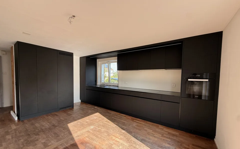 Stylishly modernized semi-detached house with high-quality construction, garden, and plenty of living quality