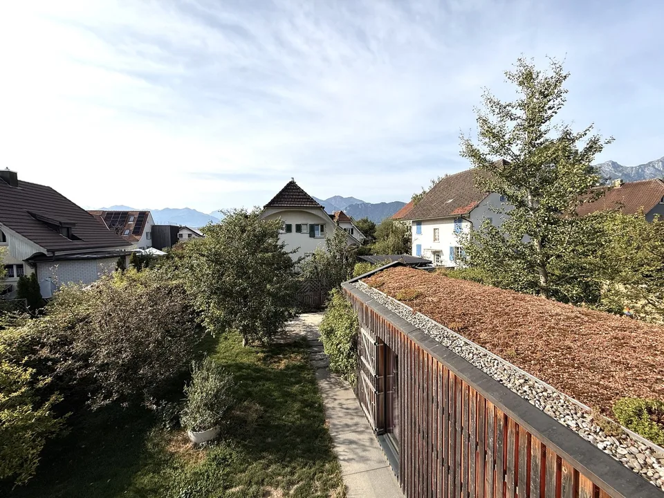 Stylishly modernized semi-detached house with high-quality construction, garden, and plenty of living quality