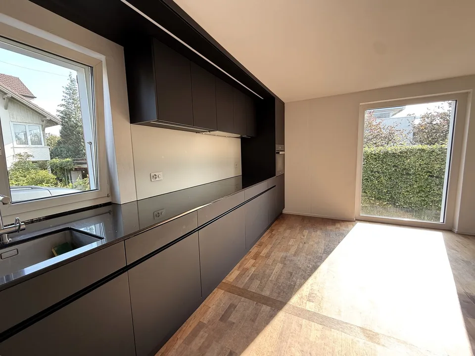 Stylishly modernized semi-detached house with high-quality construction, garden, and plenty of living quality