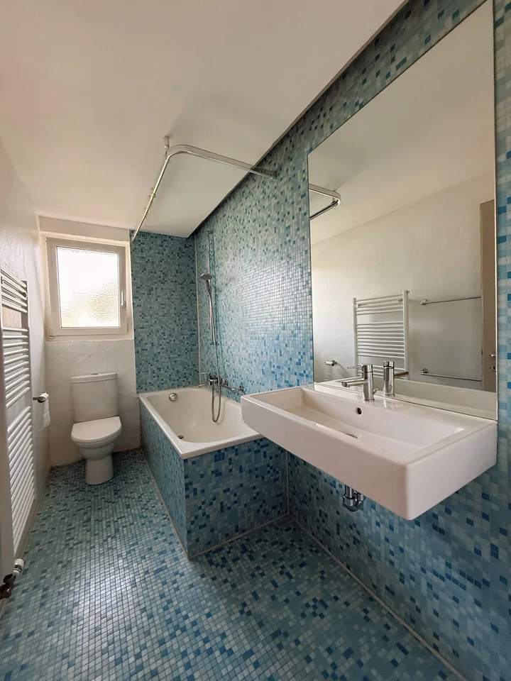 Stylishly modernized semi-detached house with high-quality construction, garden, and plenty of living quality