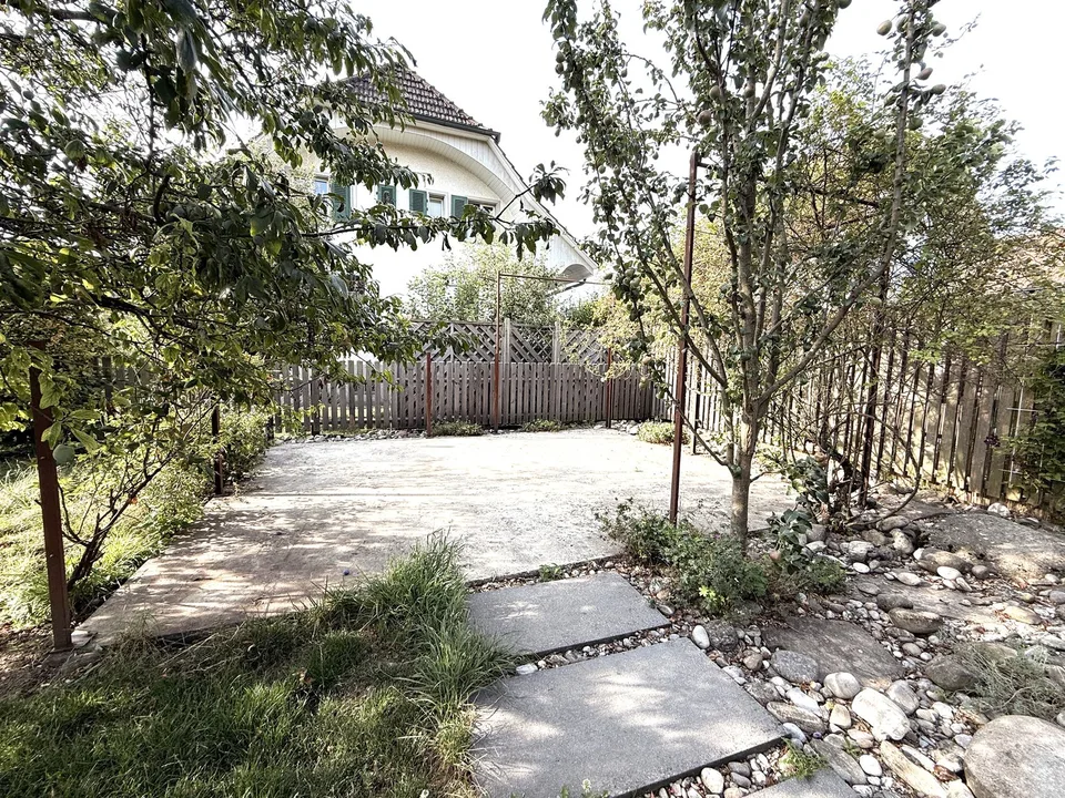 Stylishly modernized semi-detached house with high-quality construction, garden, and plenty of living quality