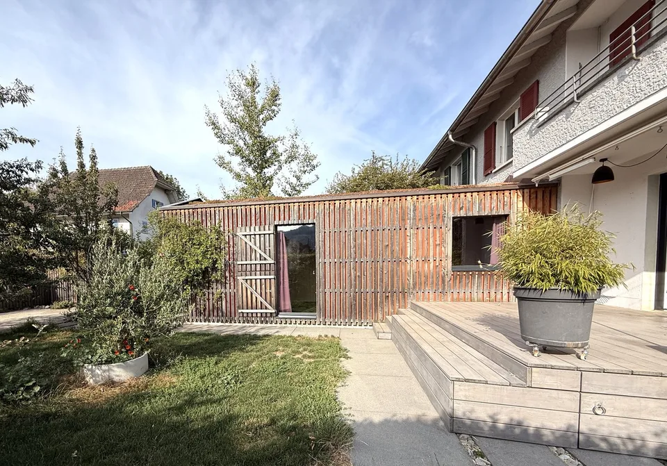 Stylishly modernized semi-detached house with high-quality construction, garden, and plenty of living quality
