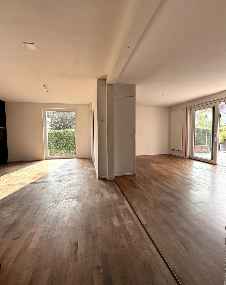 Stylishly modernized semi-detached house with high-quality construction, garden, and plenty of living quality