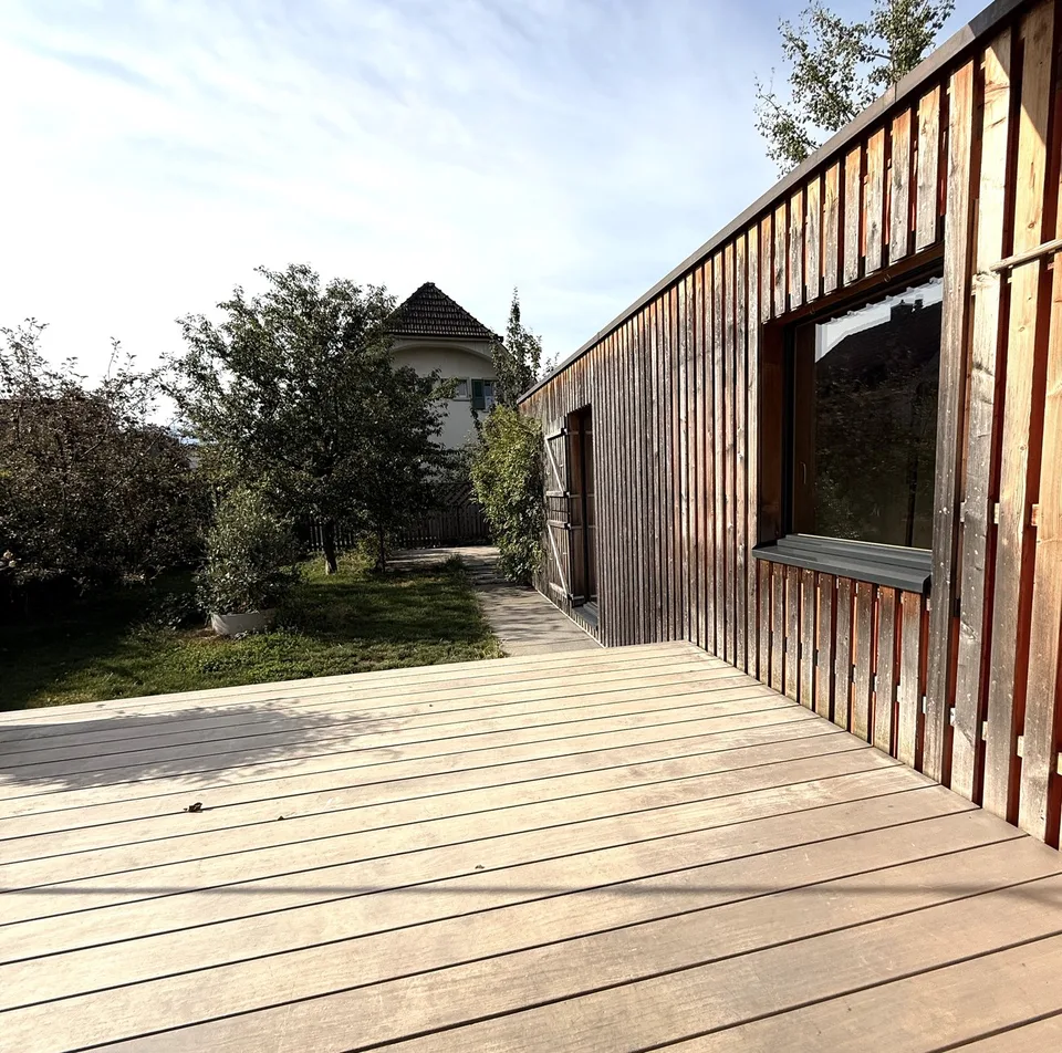 Stylishly modernized semi-detached house with high-quality construction, garden, and plenty of living quality