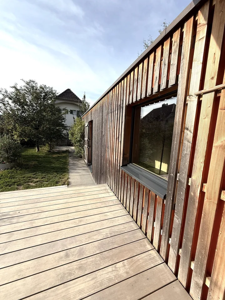 Stylishly modernized semi-detached house with high-quality construction, garden, and plenty of living quality