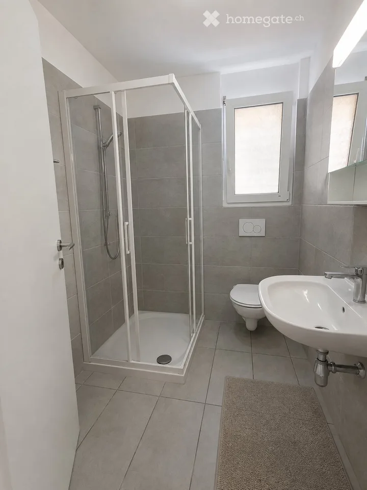 Zweieinhalb-Zimmer-Wohnung mit eigenem Garten