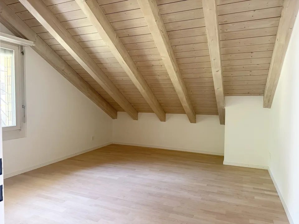 Charmante Dachwohnung an stadtnaher und sonniger Lage!