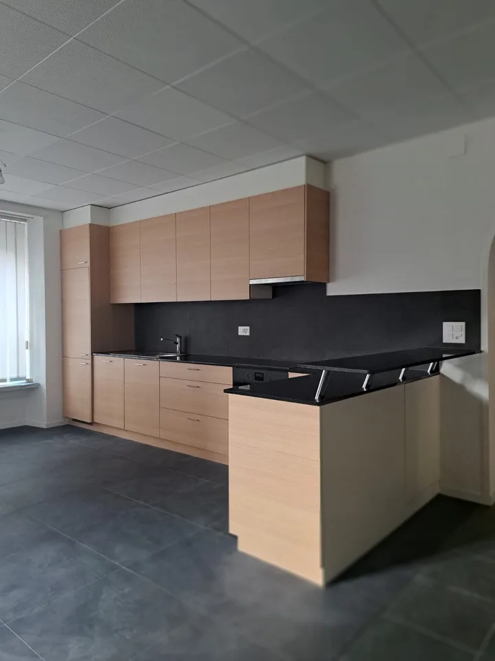 Bel appartement de 4 pièces au rez-de-chaussée surélevé au Locle