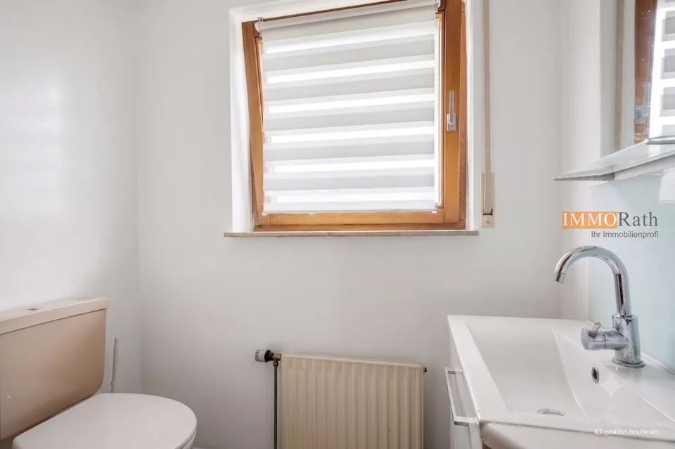 IMMORath.de - Doppelhaushälfte mit Einliegerwohnung und Garage
