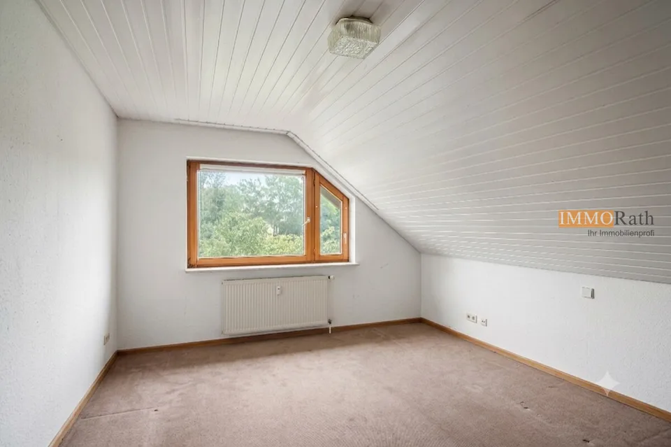 IMMORath.de - Doppelhaushälfte mit Einliegerwohnung und Garage