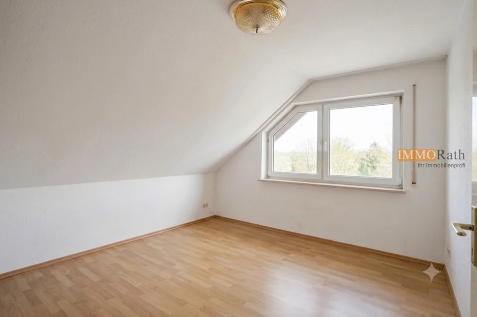 IMMORath.de - Doppelhaushälfte mit Einliegerwohnung und Garage