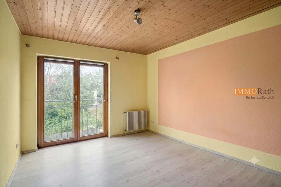 IMMORath.de - Doppelhaushälfte mit Einliegerwohnung und Garage