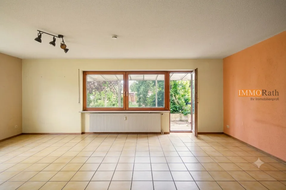 IMMORath.de - Doppelhaushälfte mit Einliegerwohnung und Garage