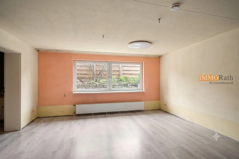 IMMORath.de - Doppelhaushälfte mit Einliegerwohnung und Garage