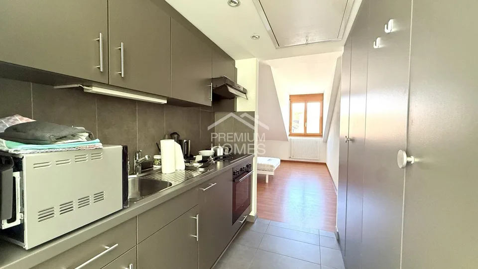 Immeuble de rendement avec 6 appartements et un commerce