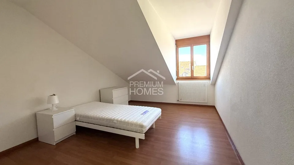Immeuble de rendement avec 6 appartements et un commerce