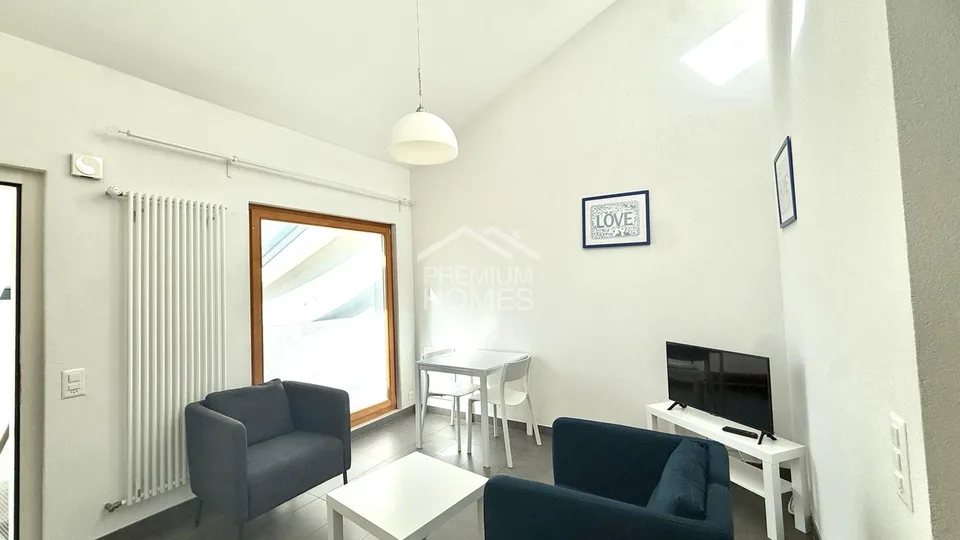 Immeuble de rendement avec 6 appartements et un commerce