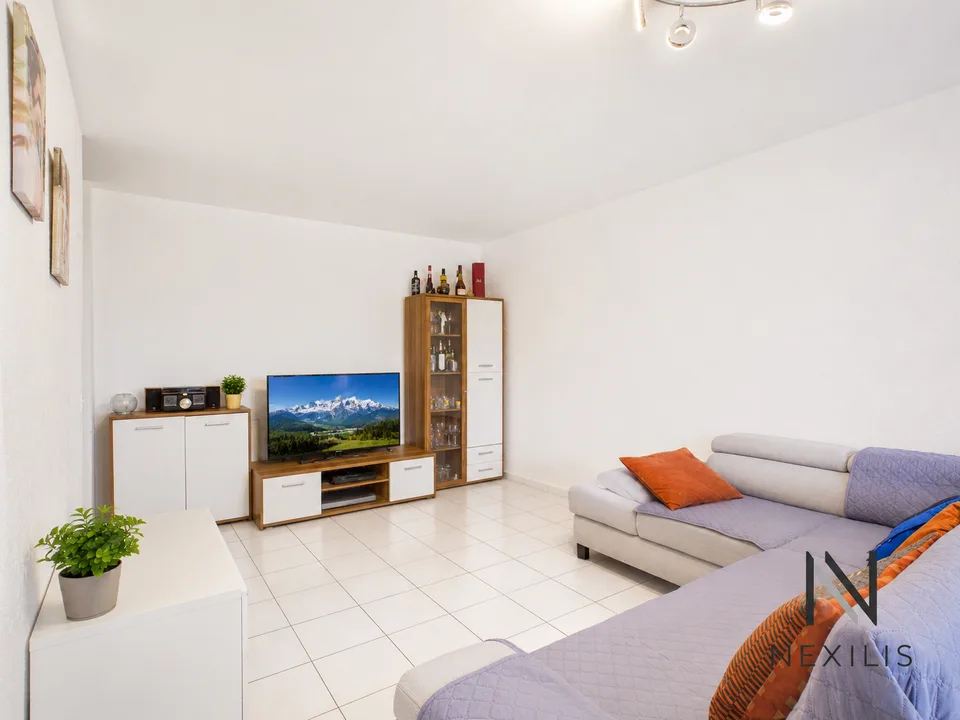 3,5 Zimmer mit Garten, Balkon und 2 Parkplätzen