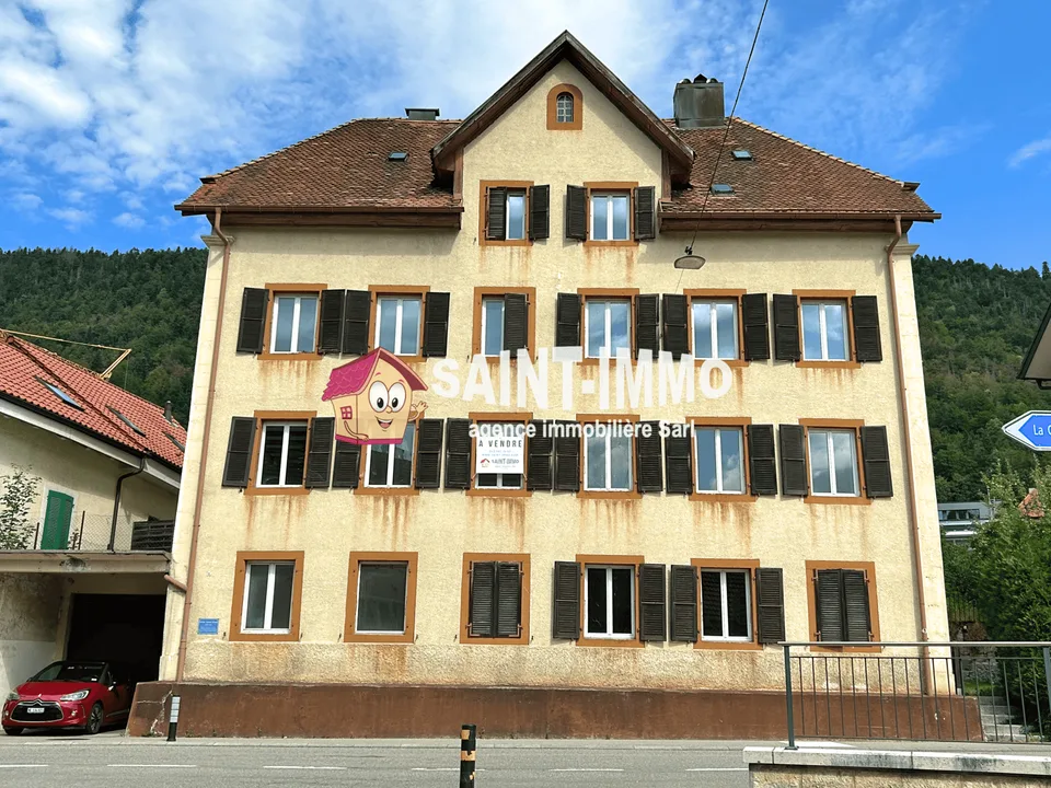 Immeuble locatif à réhabiliter de 4 appartements, un local, une parcelle constructible et un garage