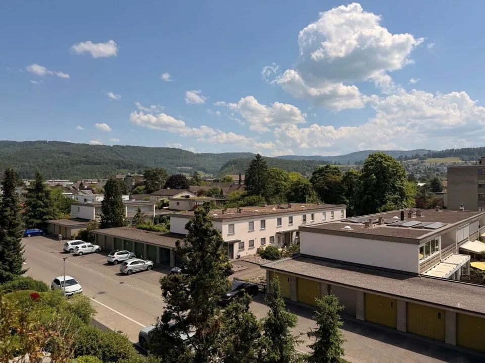 Sunny 2.5-room apartment with beautiful views and parking space in Aesch