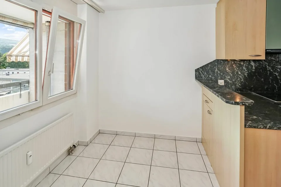 Sunny 2.5-room apartment with beautiful views and parking space in Aesch