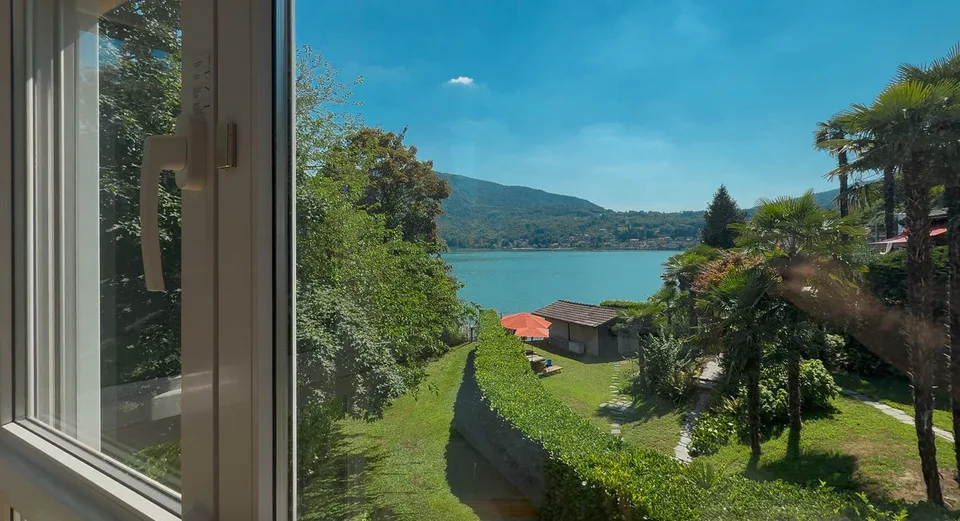 Haus am See in Caslano mit privatem Steg