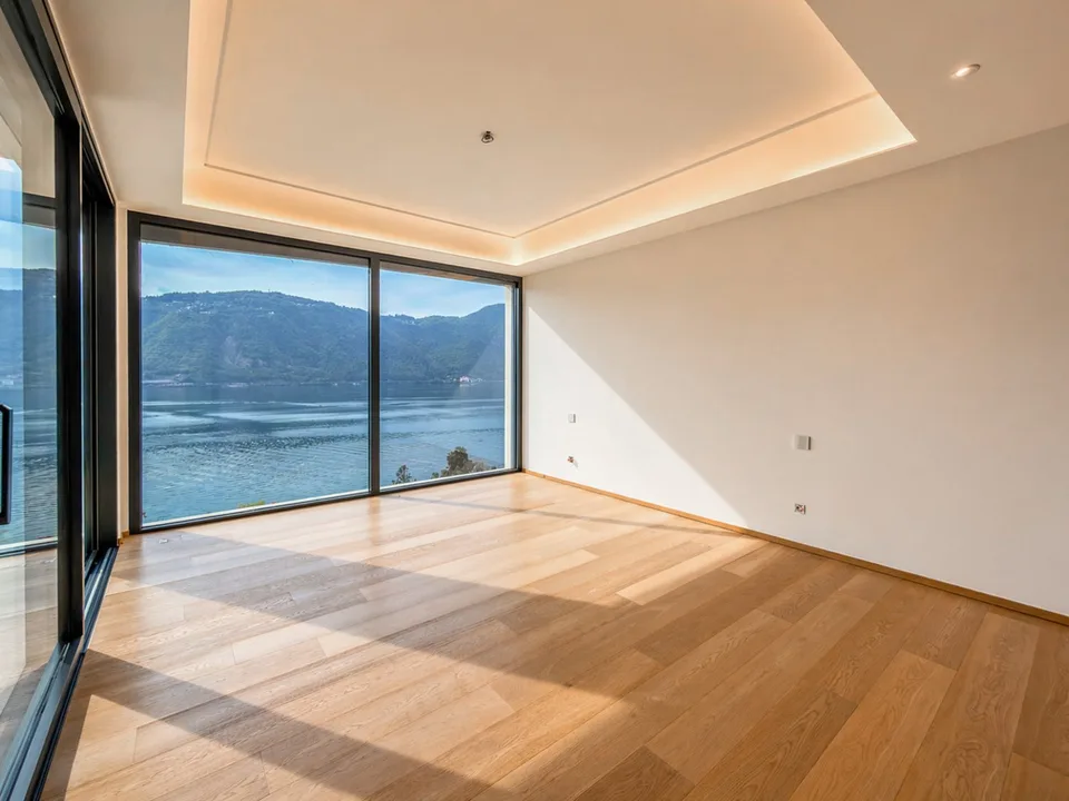 Grand appartement avec jardin et vue splendide sur le lac à Bissone
