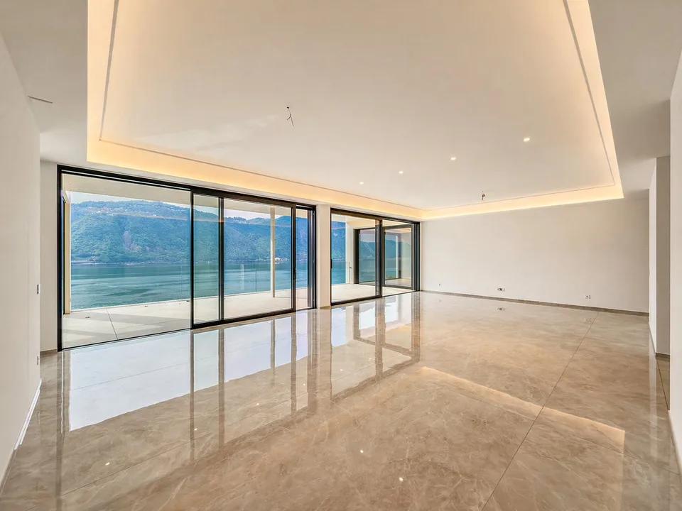 Grande appartamento con giardino e splendida vista lago a Bissone