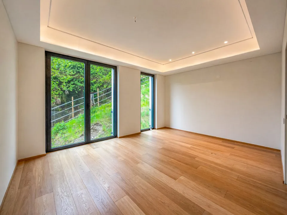 Grand appartement avec jardin et vue splendide sur le lac à Bissone